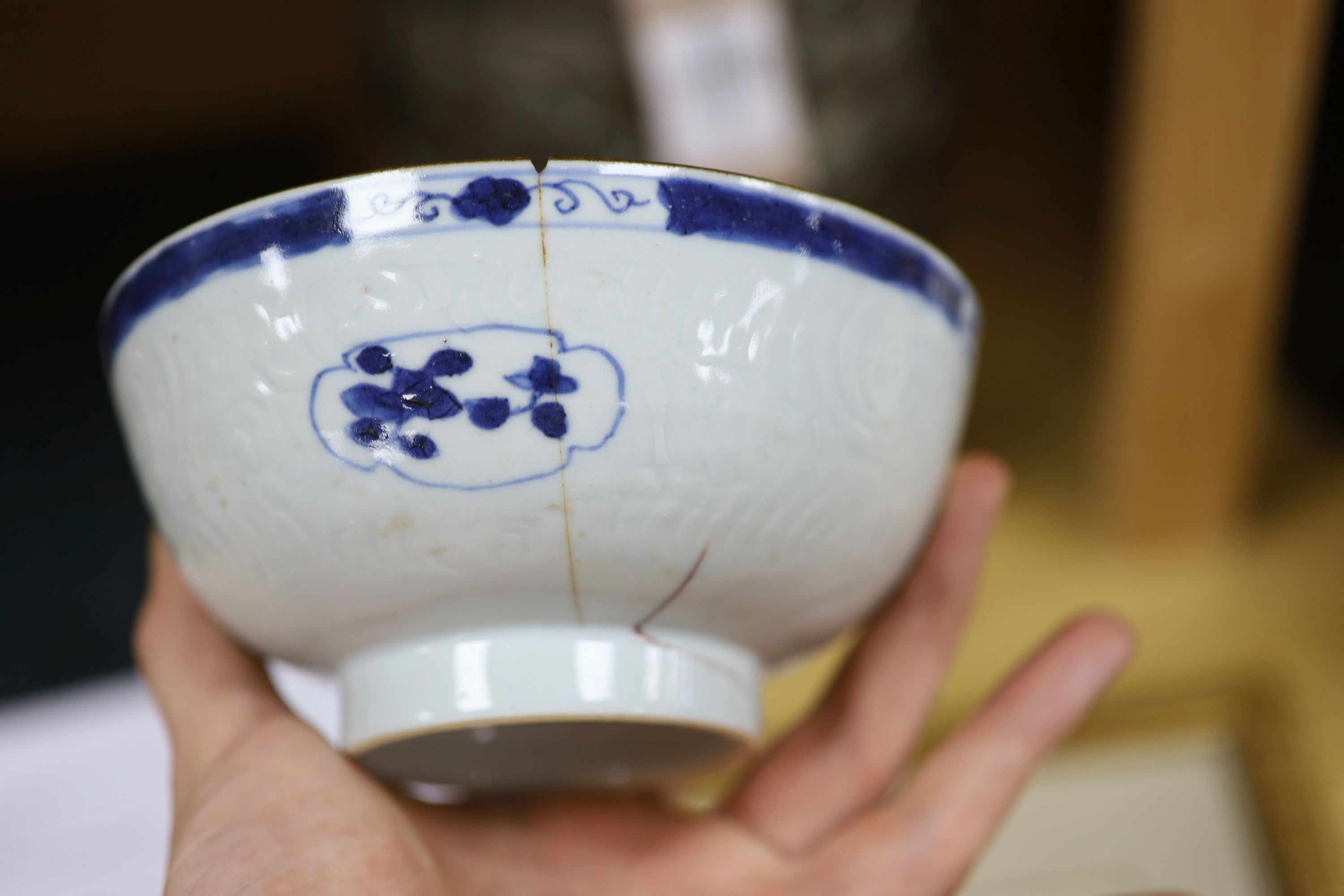 A Chinese blue and white bowl, diameter 15cm, a tea bowl and saucer, a crackleglaze shell dish and a celadon glazed stem cup